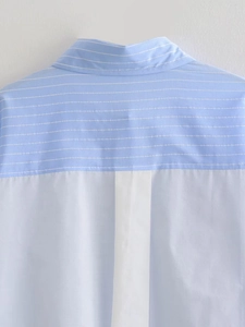 Detailed view of the Y2K contrast striped shirt featuring patchwork design and back strap