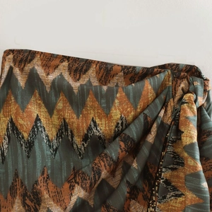 Bohemian geometric print high-waisted wrap skirt with side tie knot and beaded hem