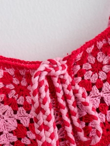 Y2K French style crochet knit dress featuring pink and red floral patterns and ties