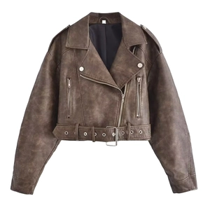 Detail of cropped vintage faux leather jacket with metal zippers and adjustable waist belt