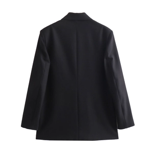 Detail view of the back seams and tailored cut of this minimalist black blazer for women