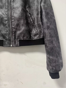 Y2K vintage distressed faux leather bomber jacket with metal zipper and ribbed cuffs