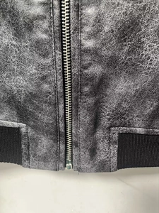 Vintage Y2K PU leather pilot jacket with distressed texture and ribbed hem detail