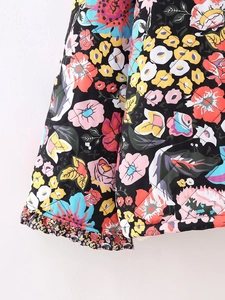 Quilted Y2K floral print jacket with colorful flower patterns and ruffled hem detail