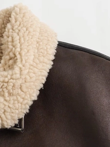 Y2K vintage brown leather jacket with white faux fur collar and metal buckle details