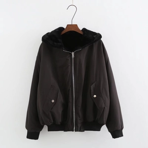 Detail of black hooded bomber jacket with faux fur lining and metal zipper closure