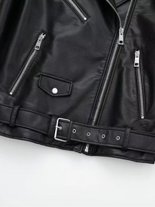 Women's black faux leather Y2K biker jacket with silver zippers and waist belt details