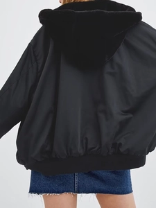 Back view of a black hooded bomber jacket with faux fur trim and ribbed hem