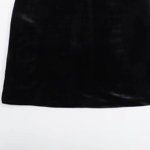 Sleeveless Y2K velvet dress in slim fit design showing a black hemline close-up view