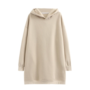 Detail view of oversized beige cotton hoodie dress with ribbed cuffs and hemline