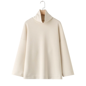 Detail showing the mock neck and premium ribbed fabric of this white women's sweatshirt