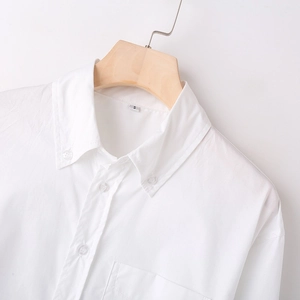 Minimalist white Y2K long sleeve cotton shirt with pointed collar and chest pocket
