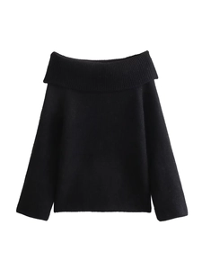 Detailed close-up of black off-the-shoulder knit sweater with ribbed texture and folded collar
