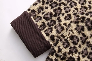 Close-up of leopard print sherpa fleece jacket with rib-knit elastic cuffs for warmth