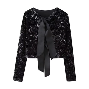 Y2K style black sequin crop top featuring a satin bow accent and long sleeves for women