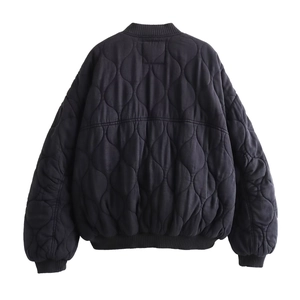 Women's Y2K wave quilted bomber jacket in black showing the detailed back view