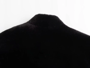 Detail view of the high-quality black faux fur collar on this Y2K aviator jacket for women