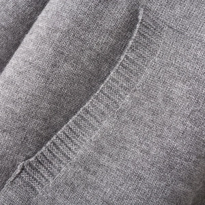 Grey Y2K style loose knit sweatshirt for women with ribbed pocket detail and soft texture
