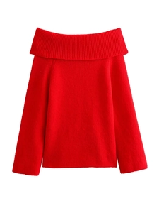 Detailed view of the red ribbed off-shoulder knit sweater with folded neckline and cuffs