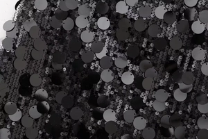 Vue macro d'un tissu à paillettes noires montrant les textures et reflets brillants