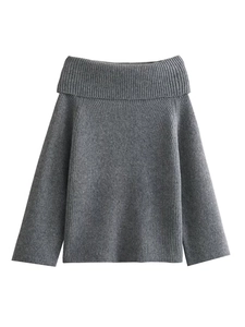 Close-up of dark grey off-shoulder knit sweater with vertical ribbed texture detail