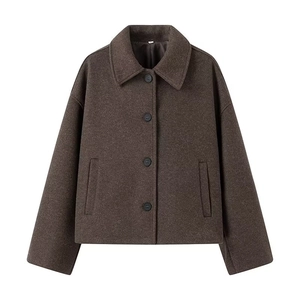 Close-up of lapel collar and single-breasted buttons on brown wool jacket