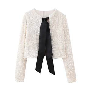 Slim fit white sequin short jacket with a black satin bow for evening parties