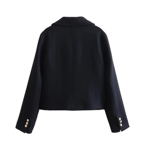 Detail view of the back of a slim fit short wool coat with gold cuff buttons