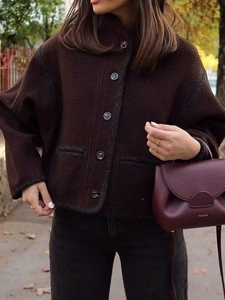 Short brown tweed jacket for women featuring stand collar and gray woven trim details