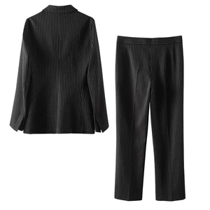Rear view of Y2K pinstripe suit set with slim fit blazer and high waist pants
