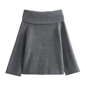 Detailed macro view of dark grey chunky knit fabric with vertical ribbed texture