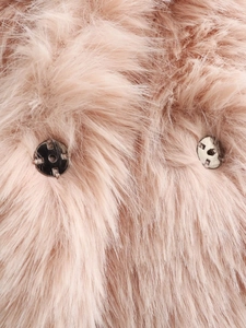 Close-up of pink faux fur jacket texture with silver metal snap button fasteners