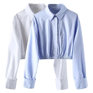 Flat lay detail of women cropped shirts with elastic hem in sky blue and white