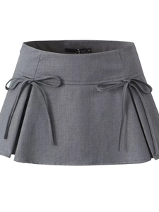 Chic grey A-line mini skirt for women featuring decorative bows and pleated design
