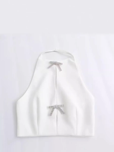 White halter neck top featuring elegant silver rhinestone bows and slim fit design