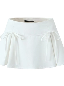 White high-waisted A-line mini skirt featuring decorative bow knots on a clean background