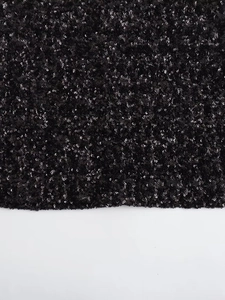 Mini robe noire sans manches style Y2K avec paillettes brillantes et épaulettes rembourrées