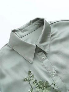 Sage green satin shirt with exquisite sequin floral embroidery and button-up collar detail