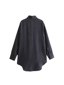 Elegant black long sleeve satin shirt for women featuring lapel collar and asymmetric hem