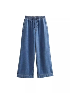 Pantalones Y2K de mezclilla azul lavado con pernera ancha y cintura elástica alta