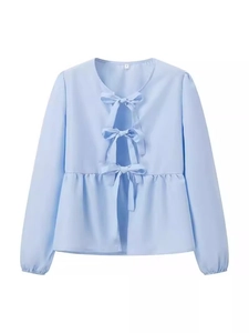 Light blue long-sleeve women shirt featuring triple bow ties and a peplum hem design