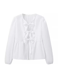 White long sleeve peplum shirt with stylish front bow ties and feminine cutouts