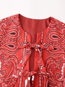 Women's red paisley print cotton vest with front tie closures and crew neckline