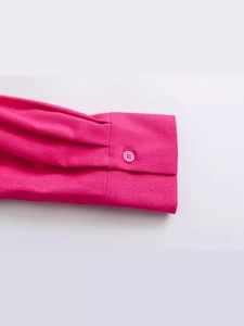 Y2K style long sleeve shirt in vibrant fuchsia with detailed pleats and matching resin button