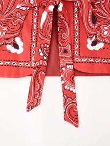 Women's streetwear vest with red paisley print and waist tie closure detail