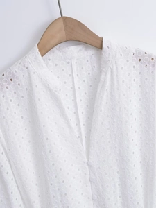 French white V-neck mini dress with eyelet embroidery and matching waist belt