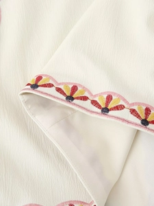 Short vintage cream vest with colorful floral embroidery and wave edges for women