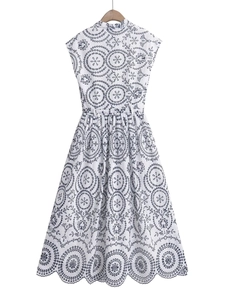 Women's V-neck sleeveless white midi dress with blue geometric embroidery and waist belt