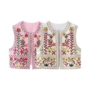 Detailed view of floral embroidery and geometric trim on Y2K spring vest cardigans
