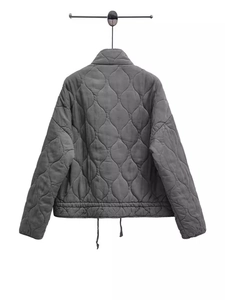 Relaxed fit women's quilted jacket with stand collar and adjustable drawstring hem